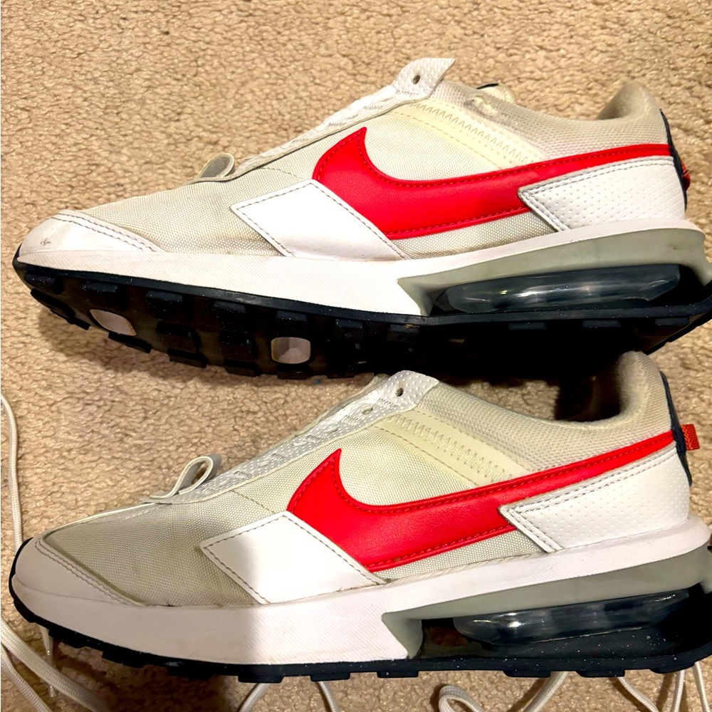 Nike Air Sneakers with Red Swoosh - women